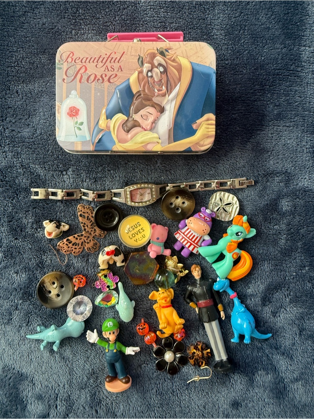 Disney Pink Beauty and the Beast Treasure Tin with Assorted Colorful Toy Charms.